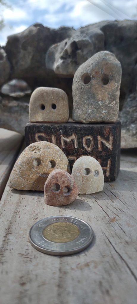 family of five limestone minimalist rock figurines