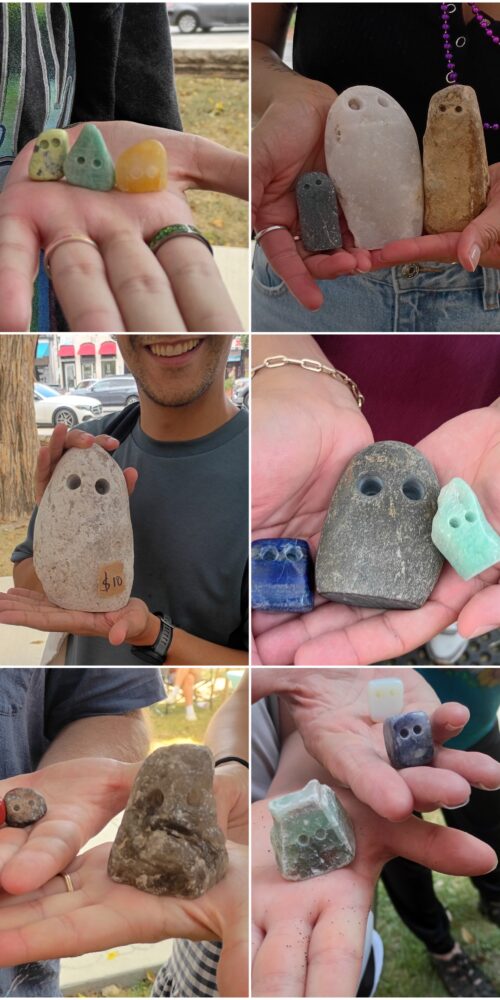 people holding rocks